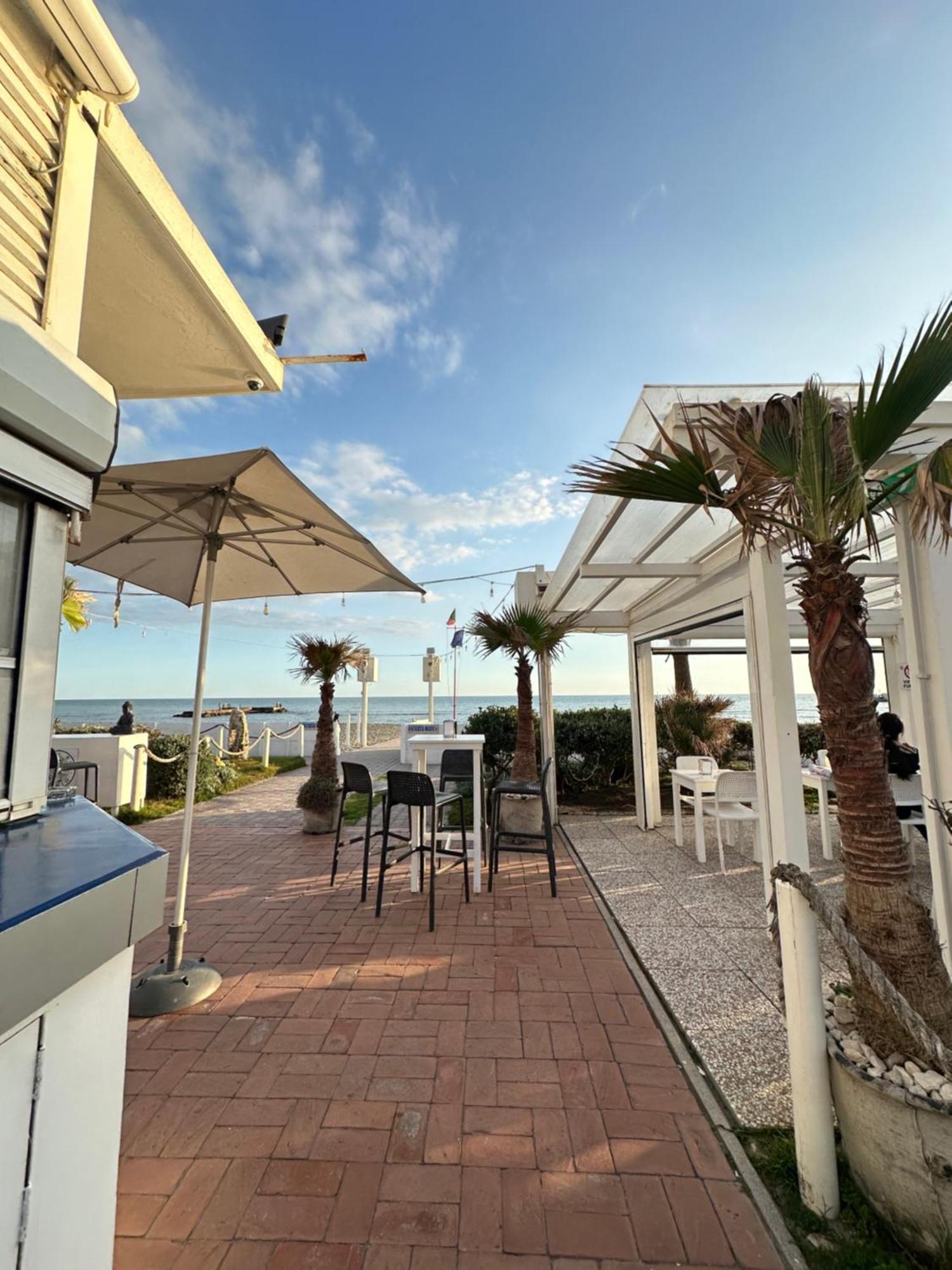 Penthouse Salus Sea View Terrace Apartment ลิโด ดิ ออสเตีย ภายนอก รูปภาพ
